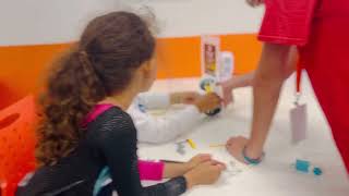 Kids getting ready for Battle Bot challenge at Code Wiz Rutherford