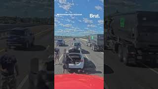 Driver punches through car window in road rage incident.