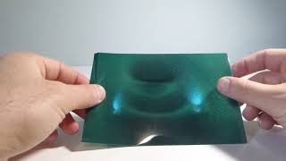 Magnetic Viewing Film During Magnet Levitation. Dielectric Plane Not Visibly Changed.