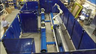 LT-ARC production robotic welding cell with dual headstock/tailstock stations