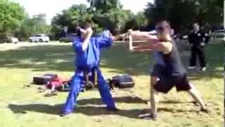 Master Rana Blindfolded Jumping Back Turning Kick Board Break