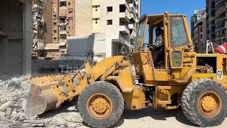 Mechanical excavator clears rubble after Israeli strikes in Beiruts southern suburbs