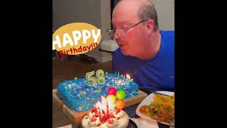 US Air-Force veteran Blowing his candle for 58th birthday.And for my granddaughter❤️ 🎉