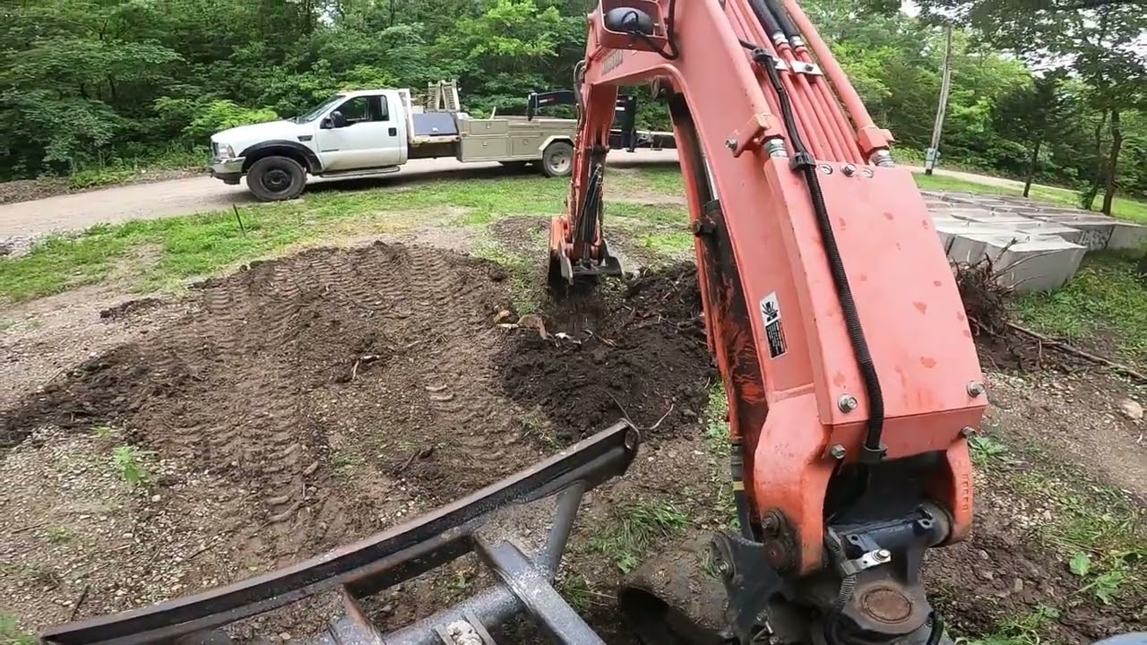 Digging out  stumps with the Kubota KX71 3