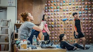 Inside look at Jain Kim rock climbing training in her family owned basement gym