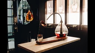 Pours A Decanter That Bows To Fill Your Glass