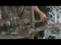 Manually operated chain link fence machine