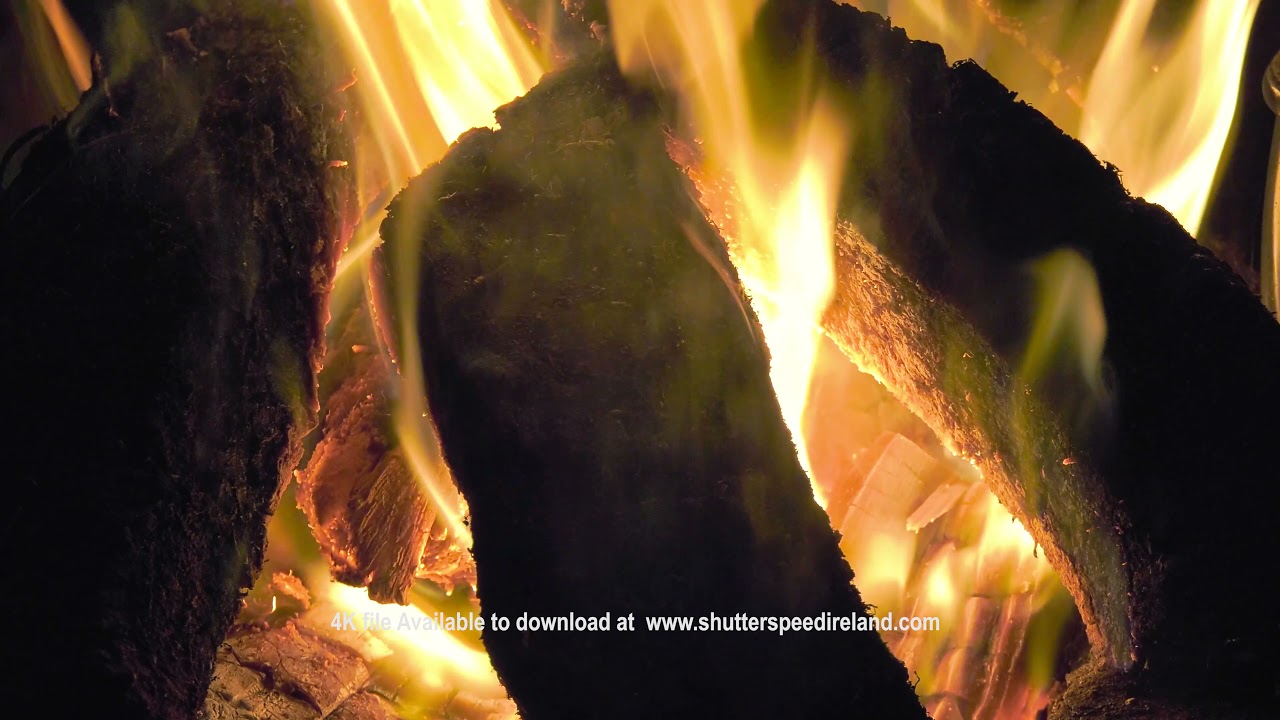 Sticks Blocks and Peat Turf burning in an open fire in Ireland 14 4K