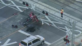 SunRail train strikes semi in Orange County, closing road, delaying commuter rail