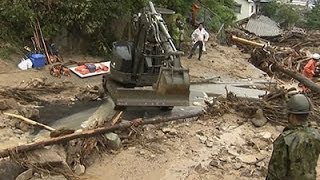 Japan Landslide Rescuers Struggle in Heavy Rain