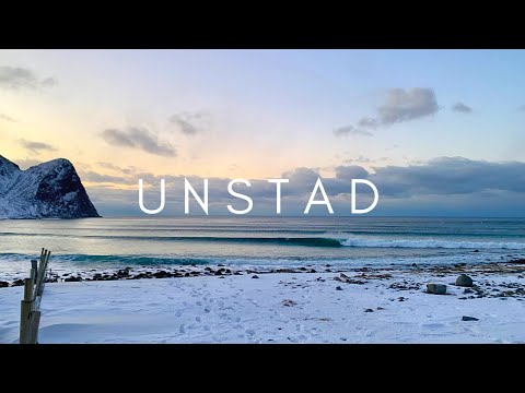 Surfing the freezing waters of Unstad, Lofoten, Norway
