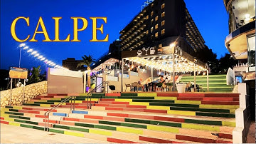 Walking along the promenade in CALPE at night , SPAIN /JULY 2024