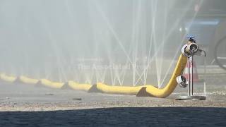 Heat warnings return to Germany, as water sprinklers cool off residents in Cologne