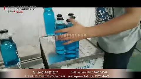 automatic vacuum capping machine with cap sorting elevator|máquina taponadora al vacío