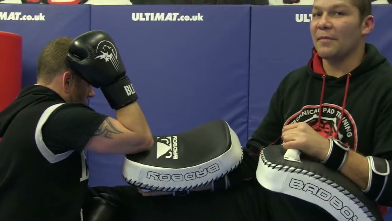 Muay Thai Pad Drills:  Kick catch to elbow