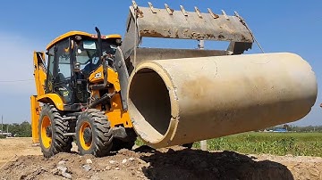 JCB Backhoe Lifting Heavy Culvert Pipe And Installing in Drain - JCB Making Village Road - JCB Dozer