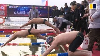 Swimmers brave icy waters in china's ...