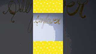 Writing &quot;Sunflower&quot; 🌻 in Cursive Writing | #shorts #calligraphy