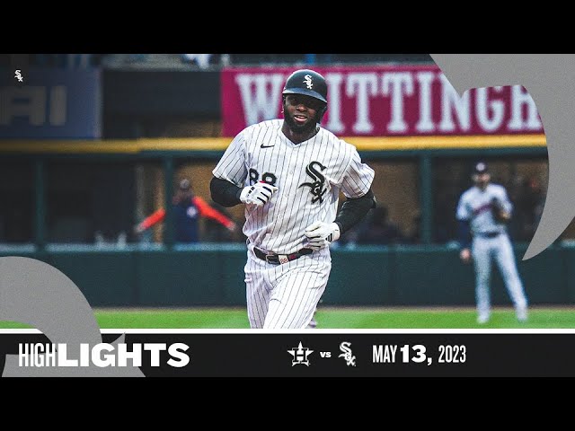 Luis Robert Jr. #88 of the Chicago White Sox reacts after hitting