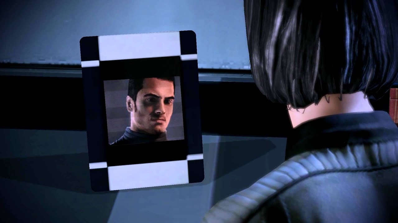 Mass Effect 2: Shepard staring at Kaidan's photo before the suicide mission