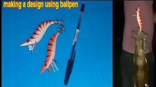 making a design for homemade wooden squid lure using ballpen.