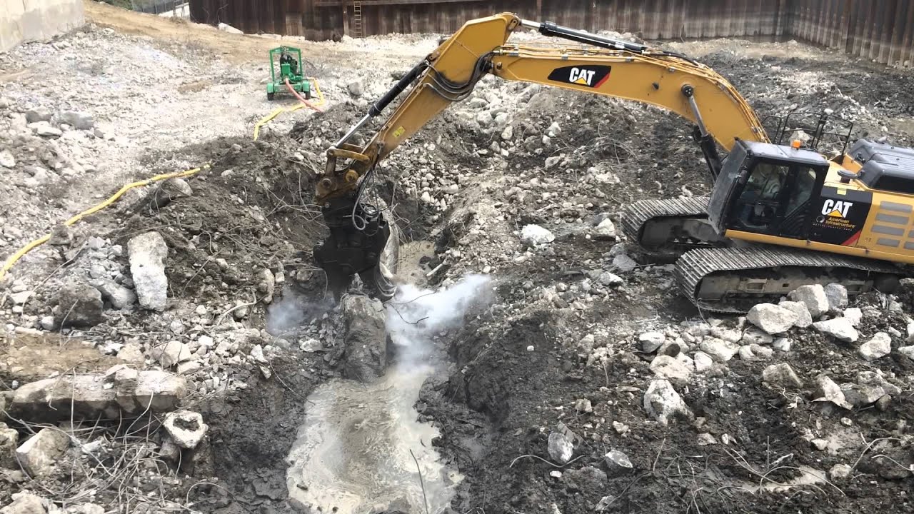 Concrete crusher crushing concrete YouTube