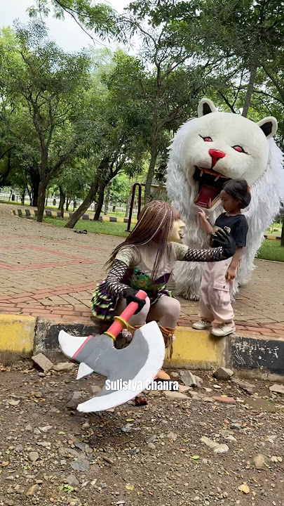 The pretty aunty looks like she's about to get a haircut because she's chasing after a dog.