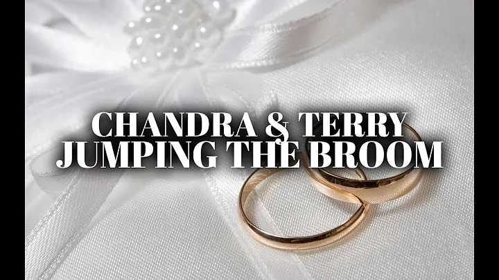 Chandra and Terry Jumping the Broom
