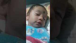 BABY SLEEPING WITH OPENING THE EYES. CUTE BABY LAUGHING VIDEO.