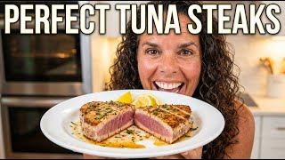 Oven baked tuna steaks with miso, garlic, cilantro, soy sauce,
mushrooms & onions