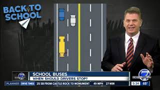When should you stop for a school bus?