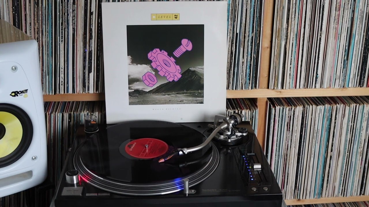 Level 42 — Level 42 - World Machine (1985) - A4 - Leaving Me Now