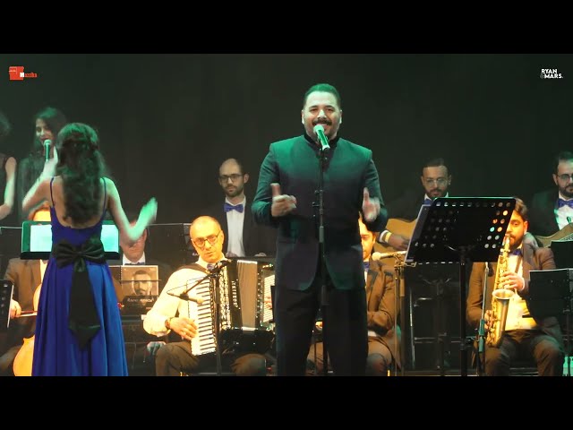 Kosset Hob (Live) -  Ramy Ayach & Mazzika Orchestra  - رامى عياش - قصة حب class=