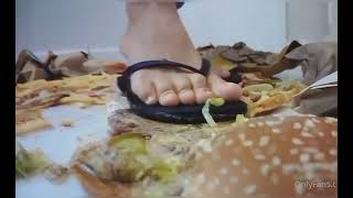 2023 Horn of Africa Food Crisis. White Woman Crushing Food Under Her Perfect Feet. (Food Crush)