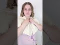 Trying on a Sweater with Extensions Cords