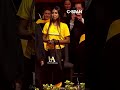 Billie Jean King tosses signed balls to grads