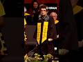 Billie Jean King tosses signed balls to grads