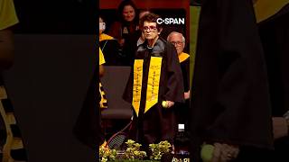 Billie Jean King tosses signed balls to grads