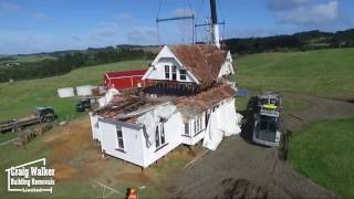 Double Story House Cut in Half and shifted on trucks