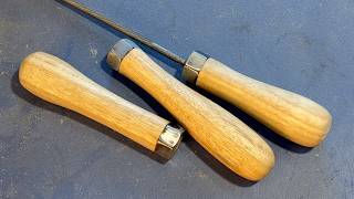 Richard Raffan turns two file handles.