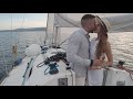 wedding couple on yacht kissing