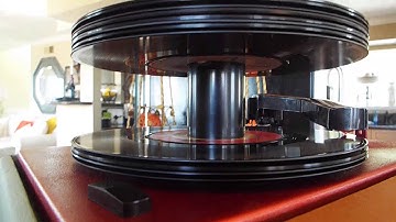 SILVERTONE 45 player playing a stack of records