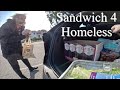 Helping homeless man  sandwiches and backpack make him feel better acts of kindness