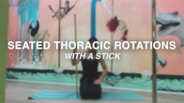 SEATED THORACIC ROTATIONS WITH STICK