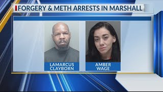 2 arrested after stolen checks found during Marshall traffic stop