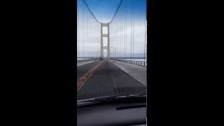 Mackinac Bridge during high wind storm cables sway Mackinaw City St Ignace Michigan