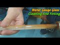 Water gauge glass cleaning & fitting.