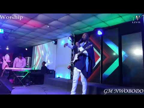 Gm Nwobodo live on stage with his guitar