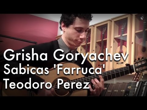 Grisha Goryachev tries out a Teodoro Perez flamenc...