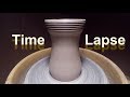 Time lapse pottery of throwing a vase on the wheel